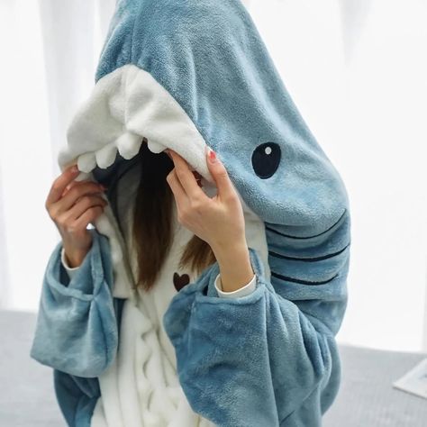 Dive into comfort with our Cozy Shark-Themed Sleeping Bag Pajamas and Shawl, perfect for both adults and children. Designed to keep you snug while unleashing your inner shark, this unique garment combines the playful charm of a cartoon shark with the practical warmth of high-quality pajamas. Whether you're lounging at home or using it as a comfortable travel companion, this versatile garment is suitable for year-round use. Key Features Realistic shark print design that wraps around your legs for an immersive and fun experience. Made from ultra-soft flannelette fabric that ensures lightweight comfort and lasting durability. Available in four sizes to cater to different heights, with an additional size recommendation for a perfect fit. Machine washable with simple care instructions for long- Shark Sleeping Bag, Shark Onesie, Shark Blanket, Shark Pajamas, Snuggle In Bed, Cartoon Shark, Shark Hoodie, Blue Shark, Hoodie Blanket