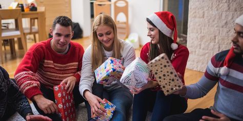 Learn How to Play Dirty Santa – The Best Christmas Game Ever | Southern Living Christmas Party Playlist, Ridiculous Gifts, Gift Exchange Party, Swap Gifts, Fun Christmas Games, Christmas Gift Exchange, Christmas Game, Santa Doll, Christmas Planning