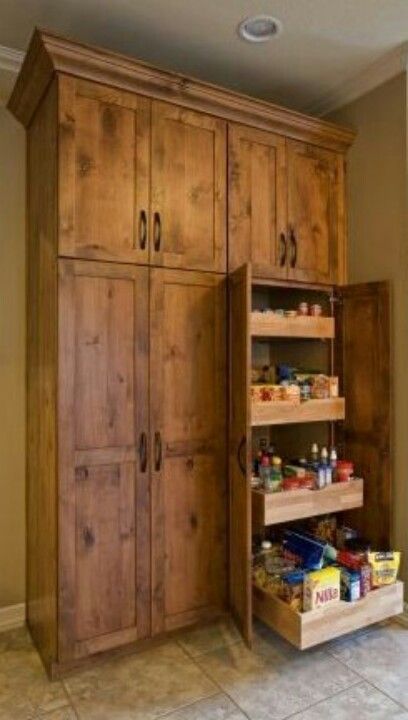 Floor to ceiling pantry-cabinets with pull-out shelving! Have this in my kitchen around the refrigerator..  love them! Pantry Cabinet Free Standing, Dapur Rustic, Pull Out Shelves, Desain Pantry, Kitchen Pantry Cabinets, Pantry Design, Pantry Cabinet, Pantry Storage, Wooden Cabinets