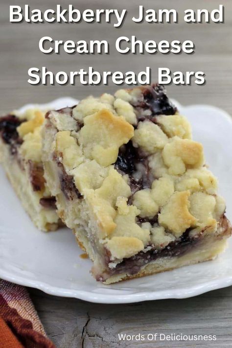 Blackberry Jam and Cream Cheese Shortbread Bars have a buttery top and bottom layer with a creamy filling made with cream cheese and jam. #blackberryjamandcreamcheesebars #wordsofdeliciousness Jam Bars Pioneer Woman, Blackberry Chocolate Dessert, Recipes Using Blackberry Jam, Blackberry Shortbread Bars, Recipes With Blackberry Jam, Cream Cheese Shortbread, Jam Desserts, Oatmeal Cream Cookies, Cream Cheese And Jam