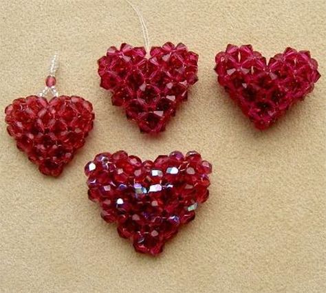 Crystal "Puffy Heart" Pattern | Bead-Patterns.com Bead Heart, Pola Manik, Beads Craft Jewelry, Beaded Heart, Beaded Beads, Beaded Jewelry Tutorials, Beaded Cross, Bead Pattern, Bead Stitching