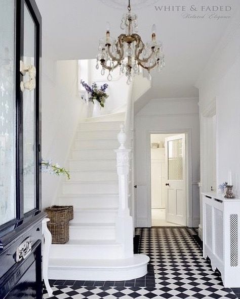 Black and White Checkered Floor Tiles and a Crystal Chandelier in a French Country Entryway via @white_and_faded French Country Entryway, Checkered Flooring, Hall Tiles, Checkered Floor, Victorian Hallway, Hall Flooring, Victorian Floor, Tiled Hallway, Hallway Inspiration