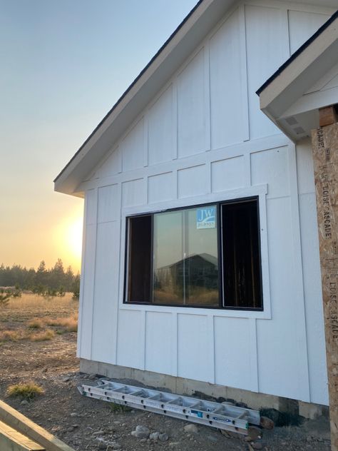 Alabaster Board And Batten Exterior, Vertical Siding Farmhouse, Vertical Cladding, Exterior Facelift, Quarry House, Hardy Board, Texas Cottage, Smurf House, Cabin Remodel