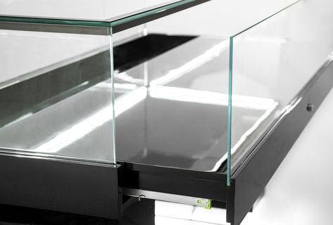 48"L x 23 1/2"D x 37 1/2"H TEMPERED & POLISHED FRAMELESS GLASS CONSTRUCTION 3/8"T GLASS THICKNESS FOUR-SDED LED TOP LIGHTING FOR BRIGHTNESS GLASS HEIGHT: 10 1/4"H BASE HEIGHT: 26 1/4" STORAGE BOTTOM W/LOCK: 26 1/4"H PULL OUT DECK W/ LOCK & KEYS SHIPS FULLY ASSEMBLED CHOOSE FROM GLOSSY WHITE OR BLACK FINISH Glass Display Case, Locks & Key, Glass Case, Glossy White, Glass Table, Display Case, 4 H, X 23, Juice