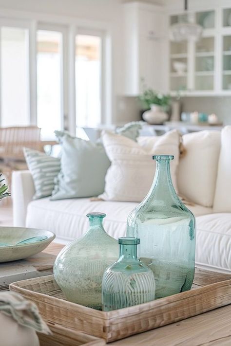 Discover 30 effortlessly chic neutral coastal decor ideas that'll make you want to kick back and soak up those beachy vibes! Coastal Shelf Decor, Country Coastal Decor, Coastal Chic Living Room, Neutral Coastal Decor, Island Home Decor, French Coastal, Coastal Style Decorating, Coastal Farmhouse Decor, Beach Themed Bedroom