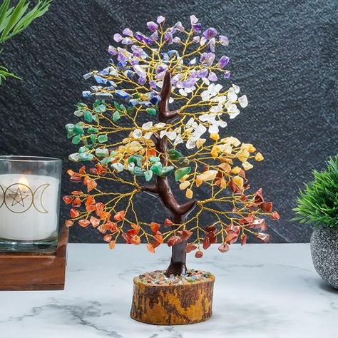 Enhance your space with the Seven Chakra Tree of Life, Crystal Tree for Positive Energy. This handmade gemstone tree features seven chakra stones, promoting positive energy and abundance. Perfect for Feng Shui, decoration, or spiritual gifts. Buy now on Amazon! Feng Shui Tree, Crystal Tree, Money Trees, Artificial Tree, Crystal Decor, Chakra Stones, Spiritual Gifts, Christmas Is Coming, Positive Energy