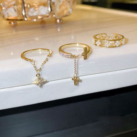 Dangle Chain Stacking Rings, Gold Open Rings, Delicate Rings, Layered Rings, Gold Pearl Rings, Y2K Rings, North Star Rings, Golden Star Ring by WithHerNYC on Etsy Gold Pearl Rings, Gold Rings Set, Rings Y2k, Rings Delicate, Cross Rings, Star Rings, Dangle Ring, Jewelry Stacking, Y2k Rings