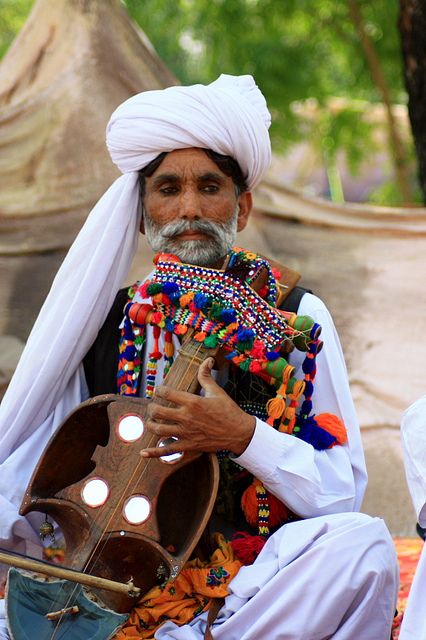 The old baloch singer, a man in tradition clothes from Balochistan, Pakistan by Engineer J Pakistani Art, Pakistan Clothes, People Of Pakistan, Pakistan Culture, Pakistani Culture, Balochi Dress, Pakistan Zindabad, Folk Dresses, India And Pakistan