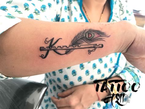 krishna tattoo name tattoo with flute feather with flute tattoo name with flute tattoo by anurag chouhan @tattoo nasha S Name Tattoo, Flute Tattoo, Name Tattoo On Hand, Krishna Tattoo, Tattoo Uk, Tattoo On Hand, Shiva Tattoo Design, Tattoo Name, Skeleton Hand Tattoo