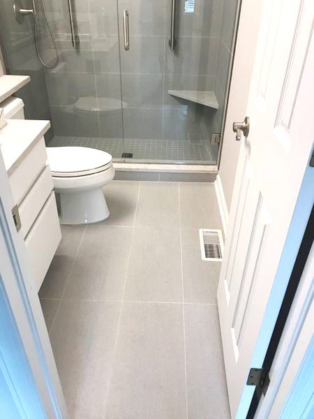 Straight Lay Tile Bathroom Floor, 12x24 Bathroom Floor Tile Layout, Light Grey Tile Floor Bathroom, Simple Bathroom Floor Tile Ideas, Light Grey Bathroom Floor Tile, 12x24 Floor Tile Patterns Bathroom, Large Tile Bathroom Floor, 12x24 Tile Floor, 12x24 Floor Tile Patterns