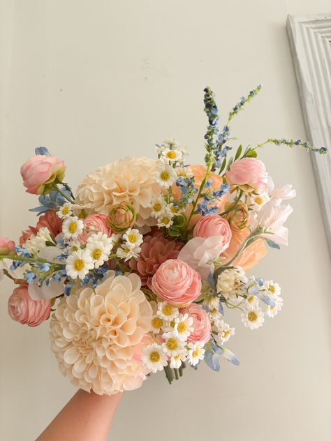 ❤The bouquet with colorful (light blue, pastel pink, white, peach) faux flowers in many types, some of which are real touch flowers.  They are perfect for spring or summer weddings~~  ❤Matching bouquets, boutonnieres... All matching items are available, please message us for a quote, we would love to work with your budget and do custom wedding packages just for you  ❤Change flower colors If you love this bouquet but want different colors, please send me a message, and we'd be happy to provide a Pastel Wildflower Wedding Bouquet, Wedding Flowers Dahlias, Neutral Wedding Colors With Pop Of Color, Spring Wedding Pastel Colors, Bouqette Of Flowers Birthday, Colorful Wedding Inspiration, Fake Flower Wedding Bouquets, Spring Wildflower Wedding Theme, Late Spring Wedding Colors