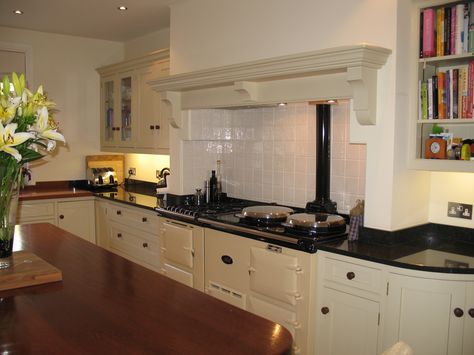 A traditional mantle over a large range cooker is a lovely feature in this kitchen. Designed and made by Mounts Hill Woodcraft.  www.mountshill.com Cooker Mantle, Traditional Mantle, Over Mantle, Small Theatre, Kitchen Stove, Range Cooker, Dining Room Storage, Luxury Kitchens, Kitchen Paint