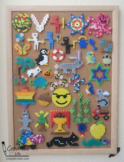 displayed on cork board Display Perler Bead Creations, Perler Bead Display Ideas, How To Display Perler Bead Art, Perler Bead Teacher Gift, Perler Bead Display, Bead Mania Ideas, Bead Display, Perler Bead Creations, Perler Designs