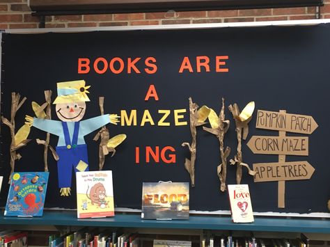 Bubble wrap, construction paper, and brown paper bags for corn stalks. Corn maze bulletin board. "Books are aMAZEing!" | Board by @librarymagrace Corn Maze Bulletin Board, Fall School Doors, Fall Library, Kitchen Boards, Desk Window, Books Display, Fair Theme, Library Bulletin Board, Brown Paper Bags