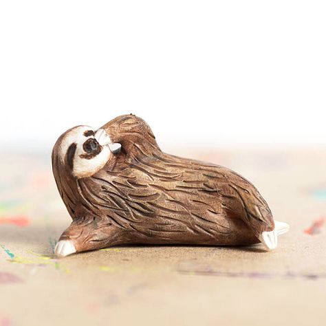 If you want a spirit animal that is as laid back and easy going as yourself, you need to carry the Le Pondering Sloth Totem with you. As opposed to a majestic eagle or a savage panther, this 1.75” polymer clay animal totem features the [...] Polymer Clay Animals, Clay Animals, Ceramic Animals, Cute Clay, Clay Figures, Animal Totems, Sculpture Clay, Clay Sculpture, Polymer Clay Art