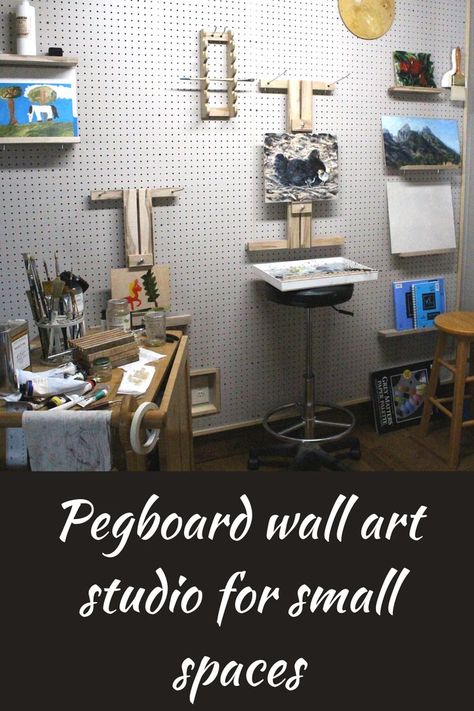 Pegboard wall with wall easel and shelves holding paintings and art supplies Art Studio Pegboard, Pegboard Easel, Pegboard Shelves, Wall Easel, Art Studio Lighting, Peg Board Walls, Studio Renovation, Pegboard Wall, Peg Wall