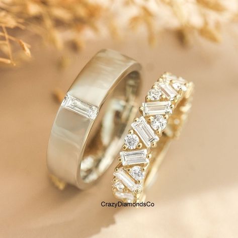 Eternity Couple Band Ring, Baguette & Round Cluster Moissanite Diamond Eternity Band, His And Her Promise Ring For Couple, Couple Rings ✹✹𝐖𝐞𝐥𝐜𝐨𝐦𝐞 𝐭𝐨 𝐂𝐫𝐚𝐳𝐲𝐃𝐢𝐚𝐦𝐨𝐧𝐝𝐬𝐂𝐨✹✹ ⇨ 1st His Ring:-> ✎ Band Wide: 5 mm Detail about stones Moissanite & Simulated Stone: ----------------------------- Stone Shape: Baguette Cut Stone Size: 5X2.50 mm Color: Colorless Cut: Excellent Clarity: VVS ⇨ 2nd Her Ring:-> Detail about stones Moissanite & Simulated Stone: ----------------------------- Stone Shape: Baguette & Round Cut Stone Size: 4X2 mm & 2 mm Weight: 4.00 TCW Color: Colorless Cut: Excellent Clarity: VVS ★ 𝑰𝒕𝒆𝒎 𝑫𝒆𝒕𝒂𝒊𝒍𝒔:- ☛ Metal Purity: Solid Gold (10KT, 14KT, 18KT); Silver(925 Sterling, 935 Argentium), 950 Platinum ☛ Metal Tone: Yellow, White, Rose ☛ Stamp/Hallmark: Yes His And Her Matching Wedding Bands, His Hers Wedding Bands, Matching Wedding Bands His And Hers, Couple Rings Wedding Gold, Unique Wedding Bands For Him, Matching Engagement Rings, His And Her Wedding Bands, Platinum Couple Rings, His And Her Rings