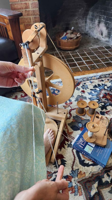 Picture of woman's hands holding yarn between fingers while sitting at spinning wheel chain plying yarn Plying Yarn, Hand Spun Yarn, Crochet Chain, Spinning Yarn, Spinning Wheel, Handspun Yarn, The Hand, Hand Spinning, Spinning