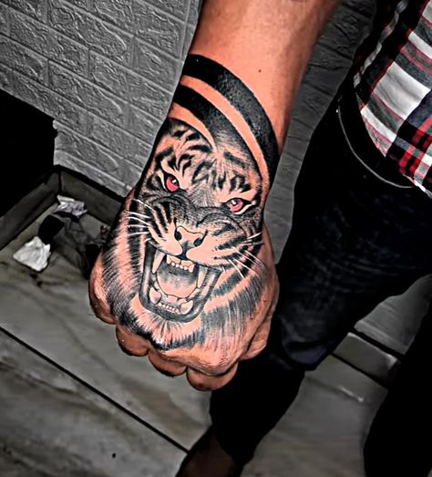 Hand Lion Tattoo Design, Lion Tattoo Hand, Lion Hand Tattoo Men, Boys Hand Tattoo, Calf Tattoo Ideas, Tiger Hand Tattoo, Lion Hand Tattoo, Arm Tattoos Black, Half Sleeve Tattoo Stencils