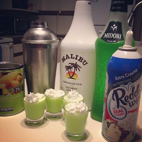 THE SCOOBY SNACK 1/2 oz. (15ml) Midori Melon Liqueur 1/2 oz. (15ml) Malibu Coconut Rum Splash of Pineapple Juice Splash of Whipped Cream #ma... Juice Splash, Midori Melon, Malibu Coconut, Melon Liqueur, Jello Shot, Scooby Snacks, Tipsy Bartender, Liquor Drinks, Shot Recipes