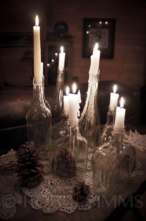 Glass bottles for candle holders. Cheap and pretty! Wine Candle Holders, Alcohol Bottle Candles, Nighstand Decor, Glass Bottle Candle Holder, Glass Bottle Candles, Vampire Decor, Bottle Candle Holder, Wine Bottle Design, Wine Bottle Candles