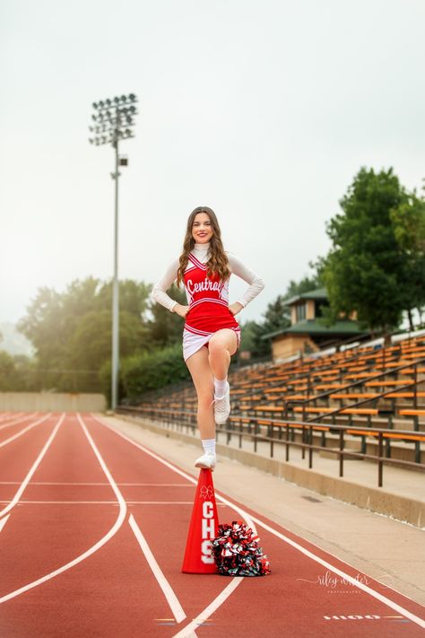 Cheer Picture Poses With Megaphone, Cool Cheer Pictures, Cheerleader Senior Pictures Unique, Cheerleading Photoshoot Senior Pics, Senior Cheer Pictures Megaphone, Cheerleader Photoshoot Poses, Cheer Pics With Megaphone, Senior Cheerleading Pictures Photo Ideas, Cheerleading Photoshoot Ideas