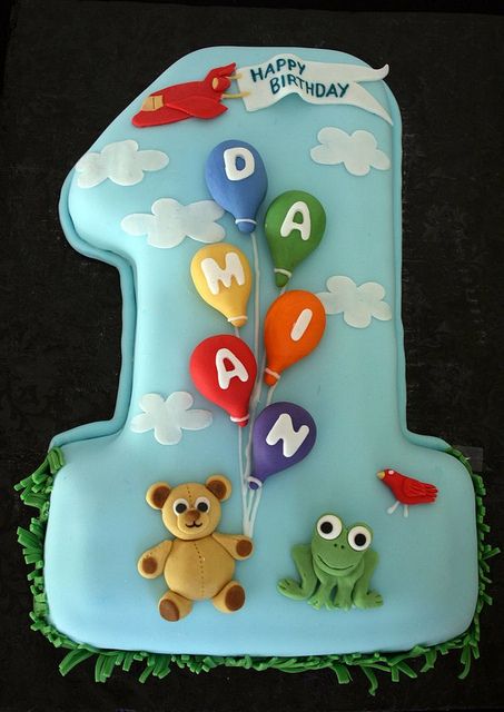 A beautiful balloon birthday cake to celebrate a first birthday. Personalised with name and favourite things; a great idea that can be adapted to any age. 1st Year Cake, Belly Cakes, 1st Bday Cake, 1st Birthday Cakes, Baby Birthday Cakes, Childrens Birthday Cakes, Baby Cakes, Number Cakes, Boy Birthday Cake