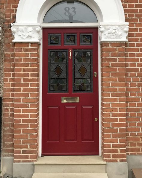 Deep red Edwardian entrance door with intricately set stained glass panels and brass door furniture. A sophisticated example of early 20th century styling. External Glass Doors, Oak Front Doors, Victorian Front Door, Front Door Styles, Red Front Door, Door Paint, Front Door Paint Colors, Stained Glass Door, Door Paint Colors