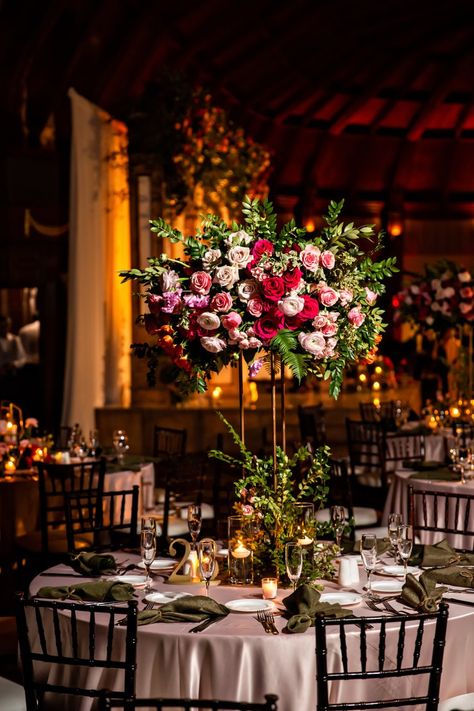 This "midnight garden" theme is a perfect fit for a romantic wedding. Wedding Table Decorations Indoor, Midnight Rose Garden Prom Theme, Midnight Garden Wedding, Spring Gala Themes, Midnight Garden Prom Theme, Midnight Garden Theme, Woodland Reception, Fairycore Wedding, Hotel Del Coronado Wedding