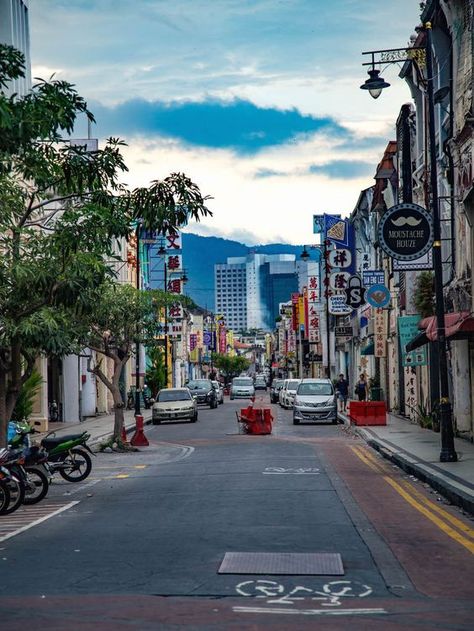 No, not the Georgetown near Washington DC, but rather the capital city of the Malaysian state Penang. Although this is the second largest city in Malaysia, it doesn’t often get visitors.  With incredible food and even more history, George Town is a large hub of authentic Malaysia with all the great aspects of a city, but without the other tourists. Penang Island Malaysia, Penang Malaysia Georgetown, Penang Malaysia Aesthetic, Penang Aesthetic, Malaysia View, Malaysia City, Georgetown Malaysia, Malaysia Trip, George Town Penang