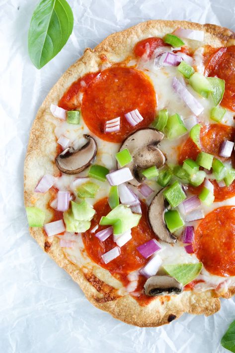 15-Minute Tortilla Pizza Recipe | The best tortilla pizza recipe! This easy flour tortilla pizza takes just 15 minutes and is crispy and crunchy! Plus, my shortcut tip for toppings! #tortillapizza #healthypizza #pizzarecipes #tortillapizzarecipe Pizza On Tortilla Wrap, Flour Tortilla Pizza, Leftover Tortillas, Recipe Tortilla, Tortilla Pizzas, Healthy Tortilla, Tortilla Recipes, Low Carb Pizza Recipes, Healthy Family Recipes