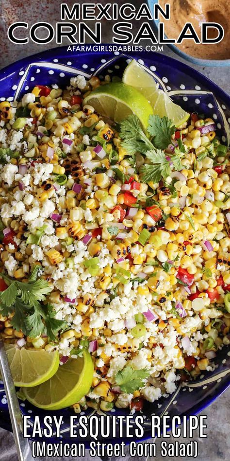 This Mexican Corn Salad, also known as esquites, is an easy recipe with BIG flavor. It features fresh sweet corn folded into a creamy, lime-spiked sauce that's flavored with simple spices. Crumbly, salty Cotija cheese finishes off the bowl - absolutely irresistible! Corn Salad Chipotle Recipe, Mexi Corn Salad, Recipe For Mexican Corn, Mexican Sweet Corn, Esquites Recipe, Mexican Corn Recipes, Summer Entertaining Recipes, Mexican Street Corn Recipe, Chipotle Recipes