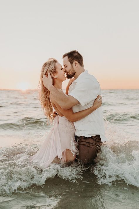 Can we just all agree engagement session in the ocean are just BETTER?!! Wow. This Bowditch park photo shoot during golden hour was freaking amazing to shoot. I love when couples trust me with these artistic images of their milestones. As a Florida wedding photographer, I'm obsessed with getting to know my couples before their weddings, and this was no exception. You do not wanna miss out on these epic shots, click the link to view! | Taylor Shea Engagement Photo Shoot Beach, Beach Maternity Pictures, Engagement Pictures Beach, Couples Beach Photography, Couple Beach Photos, Beach Photo Session, Micro Weddings, Engagement Pictures Poses, Beach Engagement Photos