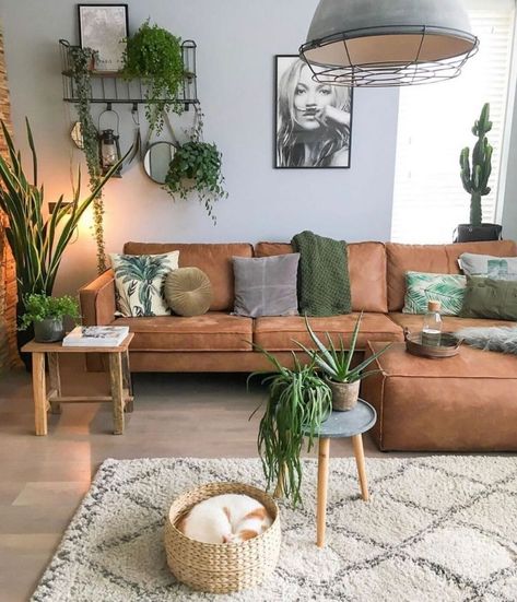 Rustic Plant Living Room, Green Yellow Brown Living Room, Wood And Green Living Room, Green And Brown Living Room Color Scheme, Tan And Green Living Room, Brown Leather Sofa Living Room Decor, Green Living Room Decorating Ideas, Rust And Green Living Room, Green And Wood Living Room