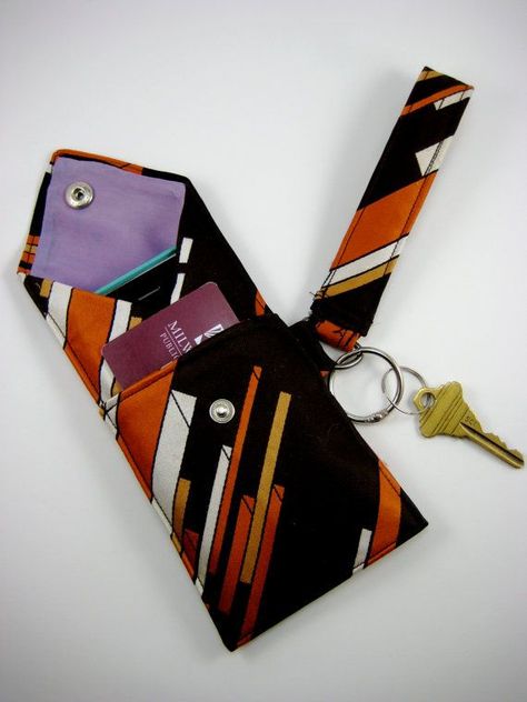 Turn a tie into a wristlet | totally want to try these once I get around to getting a sewing machine (I couldn't sew a straight line by hand if my life depended on it!) :-) Credit Card Pouch, Necktie Crafts, Diy Sy, Old Ties, Tie Crafts, Card Pouch, Cool Ideas, Sewing Bag, White Summer