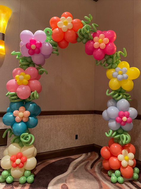 Spring Flower Balloon Arch, Balloon Flowers, Outdoor Balloon Arch, Flower Power Arch, Balloon Decoration Ideas Outdoor Balloon Arch, Flower Balloon Arch, Grad Party Theme, Balloon Decoration Ideas, Balloon Bouquet Delivery, Arch Balloon, Grad Party Decorations, Parade Float, Balloon Flowers