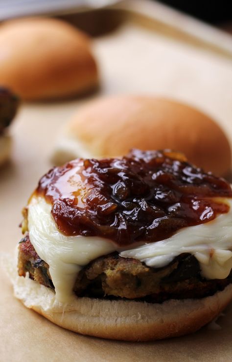 Eggplant-based veggie burgers are topped with sweet salty honey-beer glazed caramelized shallots and a layer of melted cheese to make plant-based burger that you won't forget. Eggplant Burger, Caramelized Shallots, Veggie Burgers, Eggplant Recipes, Burgers Sandwiches, Veggie Burger, Sandwiches Wraps, Burger Recipes, Melted Cheese