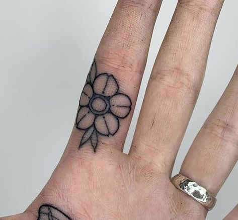 Traditional Flower Finger Tattoo, Flower Knuckle Tattoo, Feminine Knuckle Tattoos, Lotus Flower Finger Tattoo, Traditional Hand Tattoos For Women, Gothic Finger Tattoos, Traditional Finger Tattoos, Tattooed Baddie, Flower Finger Tattoo