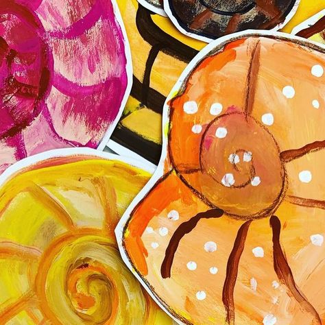 Painted Paper Art | Laura Lohmann on Instagram: "Fossil Week! 🐚🔎⛏ 🪨 2nd graders’ Ammonite paintings from the Coast of Lyme Regis. Ammonites and 🪨 rocks in abundance. We absolutely ADORE Mary Anning! ⛏ Mary Anning was an English fossil collector, dealer, and palaeontologist who became known around the world for finds she made in Jurassic marine fossil beds in the cliffs along the English Channel at Lyme Regis in the county of Dorset in Southwest England. 🐚🔎⛏ 🇬🇧#paintedpaperartlessons #kidsart #lymeregis" Painted Paper Art, Southwest England, Art Camp Projects, Camp Projects, Early Childhood Education Activities, Lyme Regis, Education Activities, English Channel, Art Camp