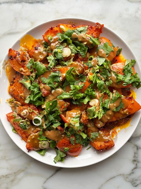 Harissa roast pumpkin with tahini sauce | Ottolenghi Recipes Brunch Salad, Ottolenghi Recipes, Bakery Products, Roasted Pumpkin, Tahini Sauce, Roast Pumpkin, Party Food And Drinks, The Flesh, London Restaurants