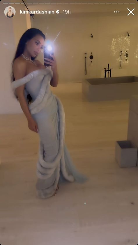 kim kardashian at her 2023 christmas eve party Kim Kardashian Christmas, Dress With Fur Trim, Kardashian Christmas, Dress With Fur, Christmas Eve Party, Winter Queen, California Christmas, Fantastic Fashion, Blue Silk Dress