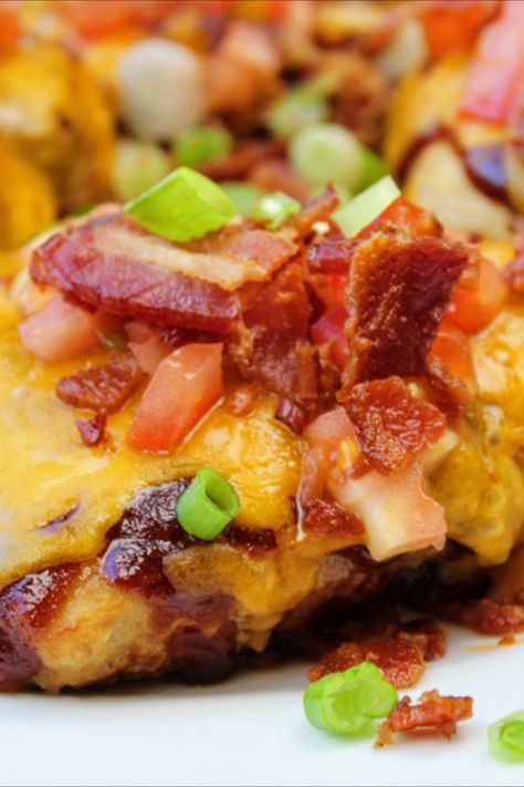 This amazing chicken recipe is cooked in a honey sauce and smothered in BBQ sauce topped with melty cheese and finished with crunchy bacon pieces, diced tomatoes, and green onions. Smothered Bbq Chicken, Bbq Cheddar Chicken, Bbq Chicken With Bacon And Cheese, Oven Bbq Chicken Breast, Bbq Chicken Breast Recipe, Oven Bbq Chicken, Bacon Bbq Sauce, Chicken Breast With Bacon, Recipes With Mozzarella Cheese