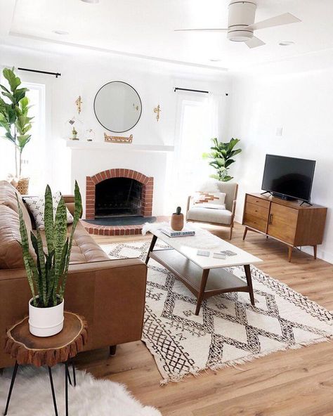 This stunning living room combines the exhale-inducing feel of minimalism with the welcoming warmth of a boho-chic aesthetic. Rustic Side Table, Mid Century Modern Living, Mid Century Modern Living Room, Living Room Scandinavian, Design Del Prodotto, Boho Living Room, Living Room Inspo, A Living Room, My New Room