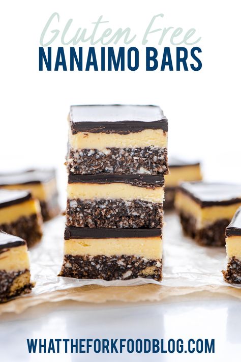 Gluten Free Nanaimo Bars are a popular Canadian no-bake dessert. They're a 3 layer bar that are simple and easy to make. They're sweet and rich, especially with that vanilla custard/cream filling and chocolate ganache! The bottom layer is made with gluten free graham cracker crumbs, coconut, and almonds. These are perfect any time of the year! Gluten free dessert recipe from @whattheforkblog - visit whattheforkfoodblog.com for more gluten free baking recipes and gluten free dessert recipes. Nanaimo Bar Recipe, What The Fork, Gluten Free Graham Crackers, Nanaimo Bars, Custard Cream, Delicious Gluten Free Recipes, Gluten Free Desserts Recipes, Cream Filling, Easy No Bake Desserts