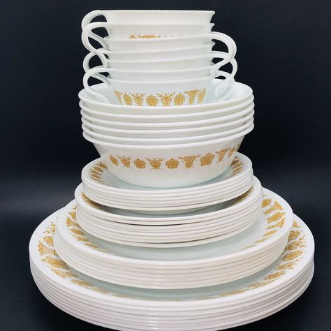 "For your consideration, Vintage Corelle Pyrex \"Butterfly Gold\" Below, are the measurements for all available pieces. - Dinner Plate (10¼\" diameter) - Salad Plate (8½\" diameter) - Bread & Butter Plate (6¾\" diameter) - Coupe Cereal/Soup Bowl (6\" diameter) - Saucer (6¼\" diameter) - Hook Cup (4\" diameter) - Platter (12\" x 10\") - Milk Glass Mug (5\" x 2.75\") - Fruit Cup (5\" x 1.5\") This set is in excellent vintage condition with no visible chips or flaws. Some pieces show a tiny bit Vintage Pyrex Collection, Corningware Vintage, Vintage Pyrex Patterns, Vintage Dishes Antiques, Corelle Patterns, Pyrex Vintage Rare, Vintage Pyrex Dishes, Corelle Dishes, Pyrex Butterfly Gold