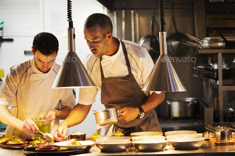 Two chefs standing in a restaurant kitchen, plating food. by Mint_Images. Two chefs standing in a restaurant kitchen, plating food. #Sponsored #restaurant, #standing, #chefs, #kitchen Plating Food, Food Cost, Restaurant Photography, Chefs Kitchen, Restaurant Kitchen, Gordon Ramsay, Chef Life, Food Plating, A Restaurant