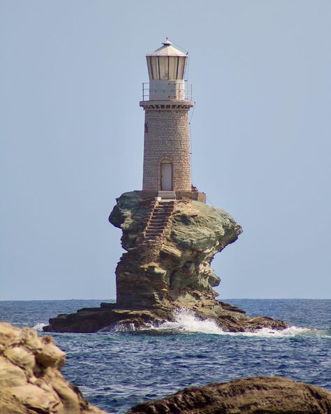 LOUIS CUTHBERT on Instagram: “The unbelievable Tourlitis Lighthouse on the Greek island of Andros that was destroyed during WWII. One of the most unique lighthouses I've…” House With Lighthouse Tower, Annisquam Lighthouse, Hunting Island Lighthouse, Lighthouse On A Cliff, Tourlitis Lighthouse, Travel Globe, Beach Villa, Greek Island, Lighthouse