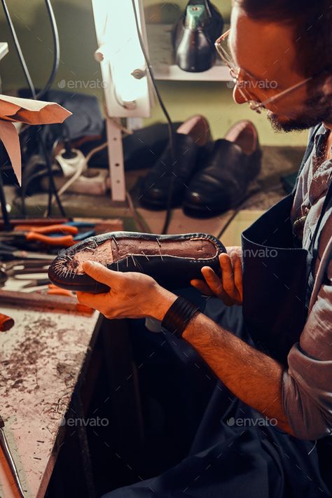 Cobbler is repairing shoes for customers by fxquadro. Diligent cobbler in glasses is working with pair of leather shoes at his workplace. #Sponsored #customers, #fxquadro, #Diligent, #Cobbler Shoe Cobbler, Shoe Repair, Free Graphics, Cobbler, Tap Shoes, Leather Shoes, Dance Shoes, Sport Shoes, Repair