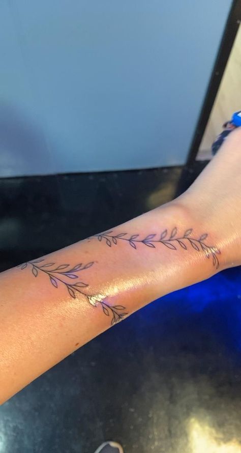 Rap Around Vine Tattoo, Vines Tattoo Wrist, Lead Wrap Around Tattoo, Bible Vine Tattoo, Vines Wrapped Around Wrist Tattoo, Vine Tattoo With Words, Vines On Wrist Tattoo, Delicate Wrap Around Tattoo, Single Line Vine Tattoo