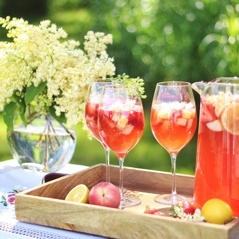 ROSÉ LYCHEE ELDERFLOWER SANGRIA - JustineCelina Elderflower Sangria, Lychee Sangria, Citrus Sangria, Clean Cocktails, Wine Cocktail Recipes, Fruit Garnish, Rose Sangria, Pretty Wine, Lilac Blossom